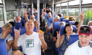 Passengers from the Westerdam cruise ship on a bus for a visit to the Cambodian capital Phnom Penh.