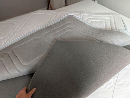 Otty Mattress Topper, showing interior foam layers.