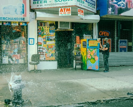 A man uses a community fridge in the Bronx.