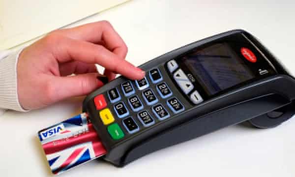 Someone enters their PIN into a card reader