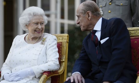 The Queen and the Duke of Edinburgh attend a garden party in Paris.
