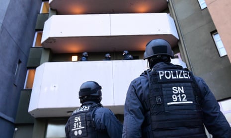 Police officers in Berlin carry out a raid on 17 November linked to the Green Vault burglary in Dresden.