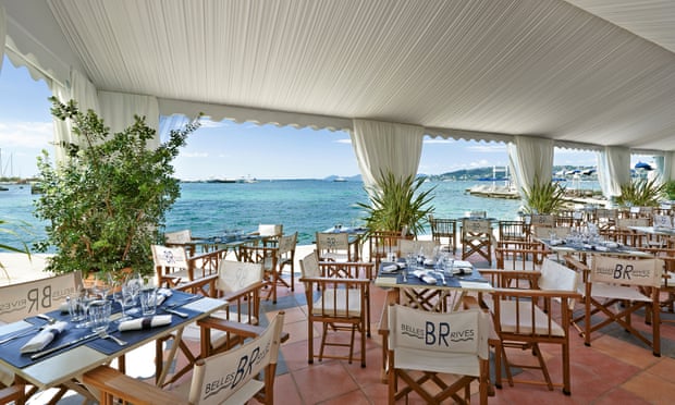 Dining patio at the Belle Rives hotel overlooking the sea