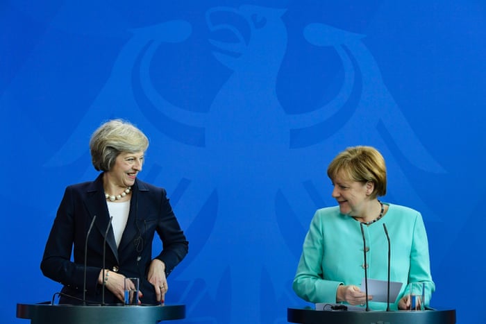 theresa may visits angela merkel in