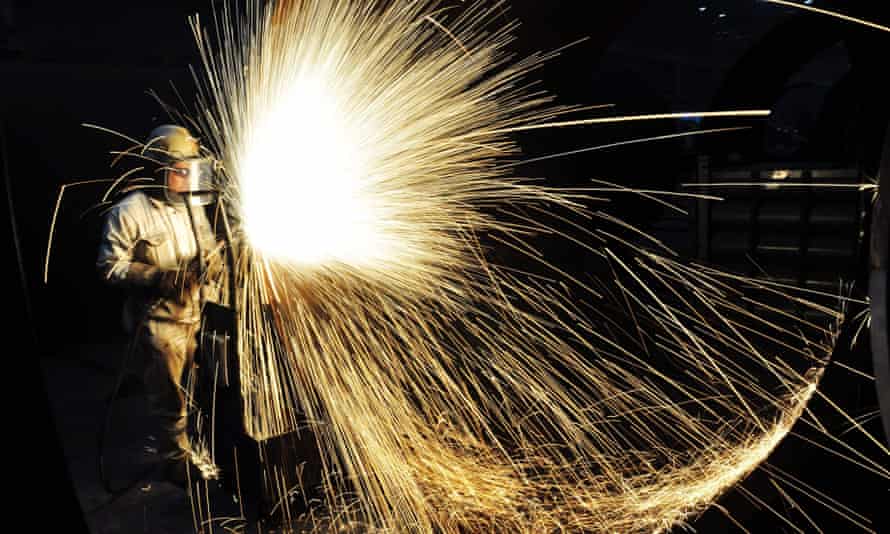 A worker cutting steel in Qingdao in China’s eastern Shandong province.