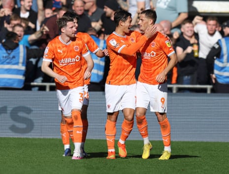 Blackpool celebrate going 1-0 up against Preston. 