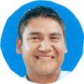 man smiling with blue background