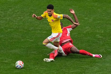 Denis Zakaria slides into Colombia's Luis Diaz and sunsequently receives a yellow card