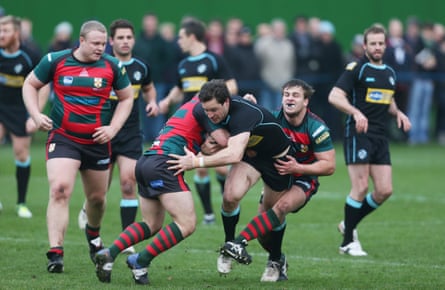 Los London Scholars juegan contra los London Broncos en un partido amistoso.