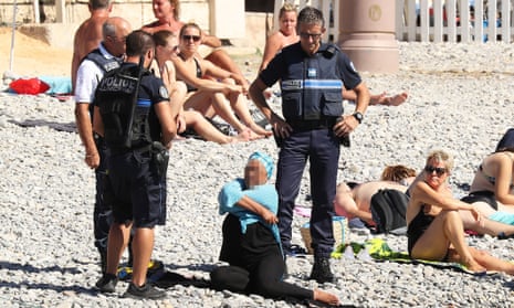 Public Beach Teen Sex - French police make woman remove clothing on Nice beach following burkini  ban | France | The Guardian