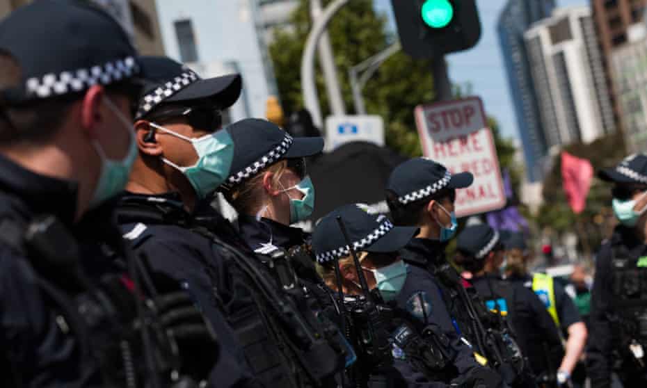 Police at a climate protest in Melbourne in December 2020. ‘Australians do not enjoy a universal right to protest, protected by law, even though our history is littered with popular movements and disruptive protests that have helped to create modern Australia.’