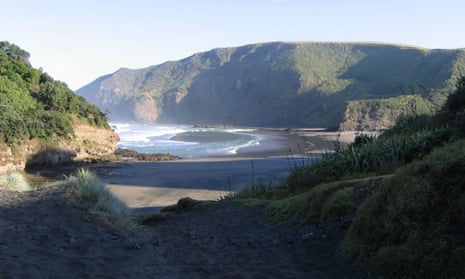 Police officers swept Bethells Beach, west of Auckland, after 19 packages of cocaine washed up on the sand on Wednesday night. 