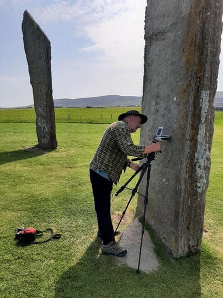 Prof Nick Pearce analysing a stone at Stonehenge