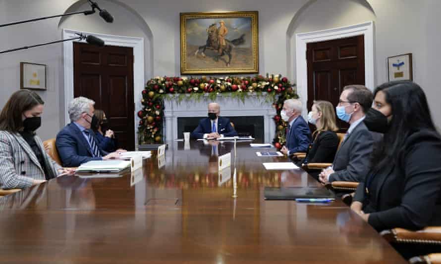Biden at table with advisers