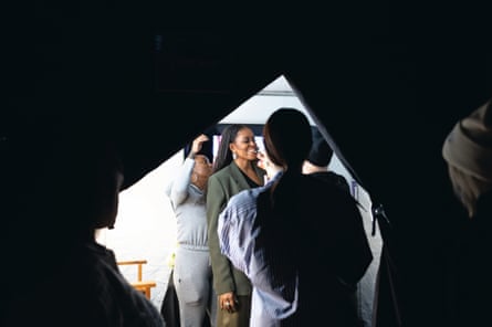 a woman getting her makeup done