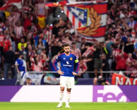 Bruno Fernandes looks down at the pitch