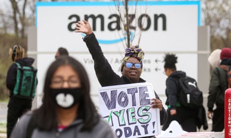An Amazon Labor Union organizer greets workers outside Amazon’s LDJ5 sortation center, in Staten Island, New York City, 25 April 2022. 