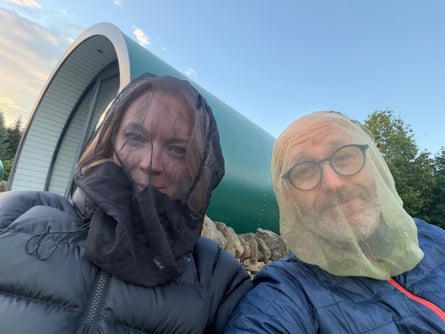 Couple in midge-proof clothes