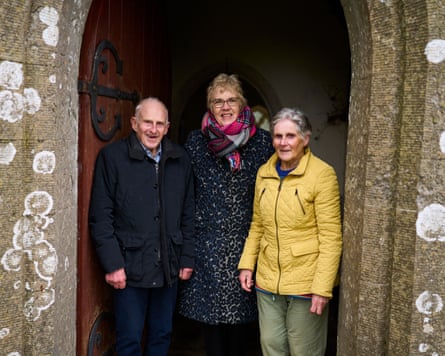 (From left) Former warden Tom Bown, his wife Jane and Tom’s sister Peggy Thomas in the stone doorway