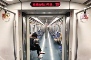 A largely empty subway train in Beijing. Millions of people across China are in lockdown.