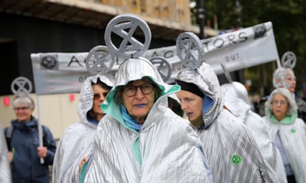Demonstrators calling themselves ‘Aged Agitators’ support Extinction Rebellion outside the Houses of Parliament in October 2019.