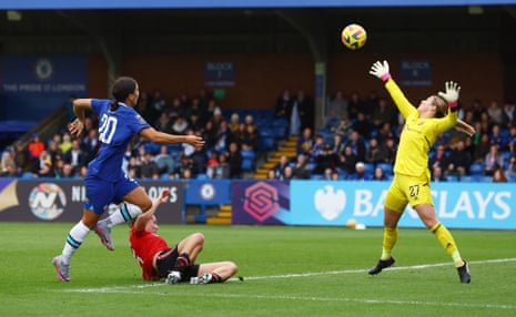 Sam Kerr scores opening goal past Mary Earps in the Manchester United goal.