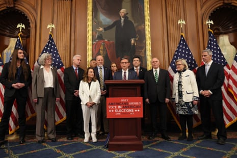 a group of people lined up in front of a podium