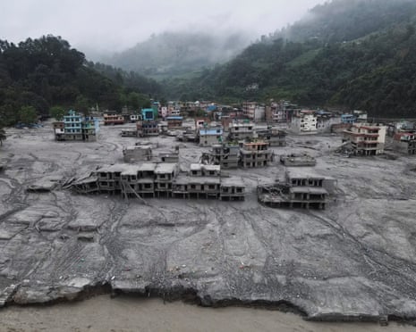 A drone view of houses covered in mud at Devighat, Nuwakot district, Nepal