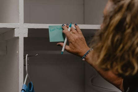 A hand presses a Post-it with the word ‘fortitude’ written on it