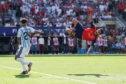 Argentina’s Enzo Fernandez fouls Spain’s Pau Cubarsi and is later shown a second yellow card leading to a red.