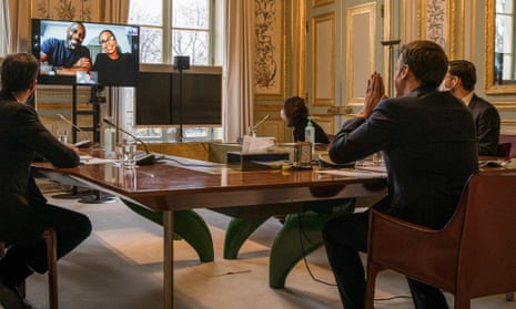 The French president, Emmanuel Macron, takes part in the virtual conference with Idris Elba and Sabrina Dhowre Elba