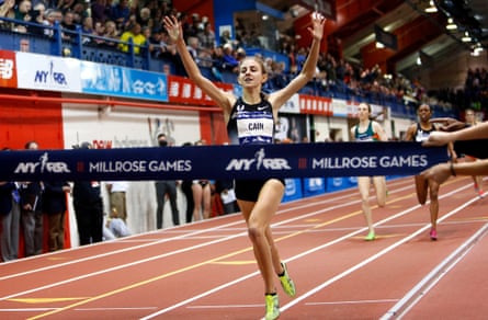 Mary Cain celebrates as she crosses the finish line to win the Wanamaker Mile in 2014.