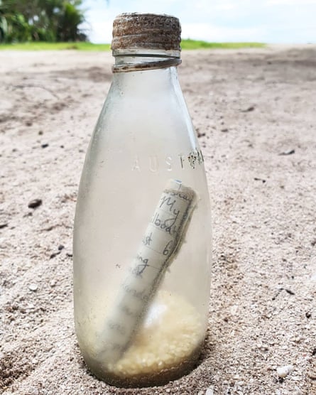 Message in a bottle. A note dropped by American teenager Niki Nie from a sailboat that washed up on a remote Papua New Guinean island.