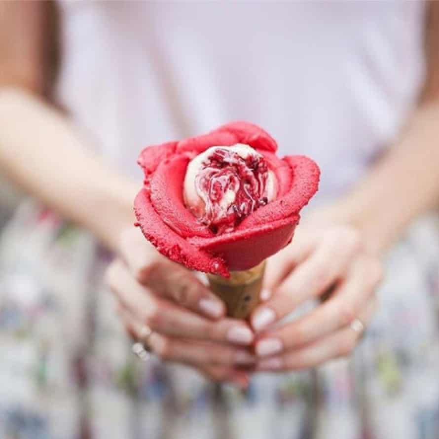 Ice-cream cone with ice-cream served in a petal design, from Amorino, Nimes, France.