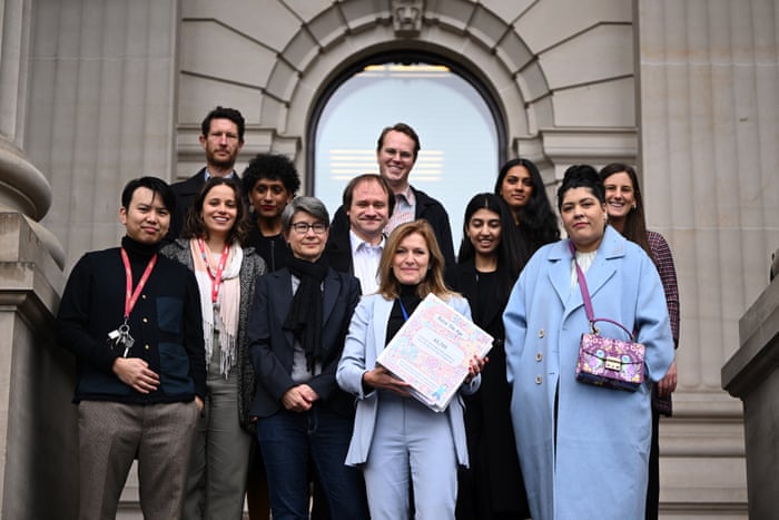Fiona Patten and constituents holding a petition