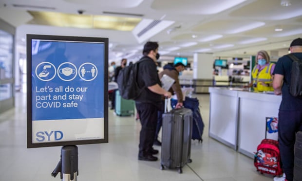 Passengers line up for Covid check at Sydney airport in Sydney. australia,Omicron Covid variant,New South Wales,Dominic Perrottet,harbouchanews