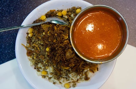 Koshary, a popular carb-dense dish, is served in a restaurant in Cairo.