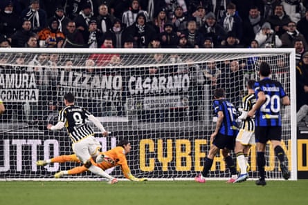 Dusan Vlahovic scores to give Juventus the lead in the 1-1 draw with Inter.