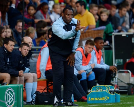 England’s coach Noel Blake issues instructions to his Under 19 players during a friendly against Germany in September 2012