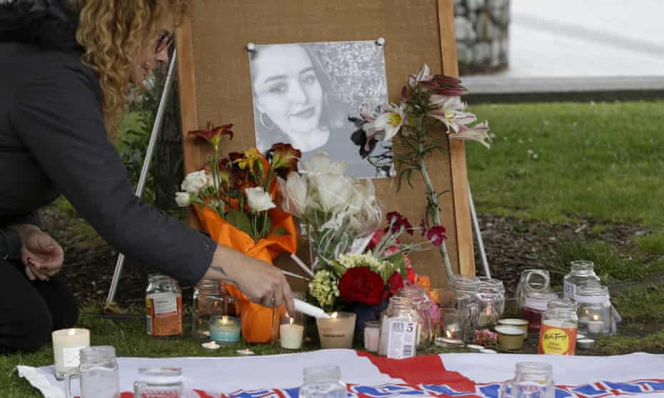 Tributes are placed at a memorial for Grace Millane after her killing in December 2018 in Auckland, New Zealand. 