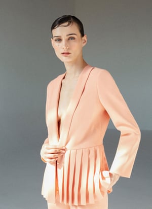 Uterque’s peach pleated blazer.