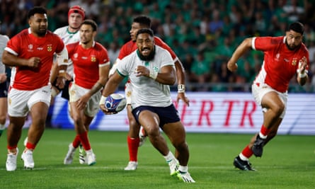 Ireland’s Bundee Aki sets off on a try-scoring run against Tonga at the Stade de la Beaujoire in Nantes.