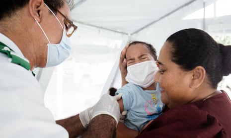 One-year-old Sanele receiving her MMR vaccination at the Poutasi district hospital in the Samoan town of Poutasi