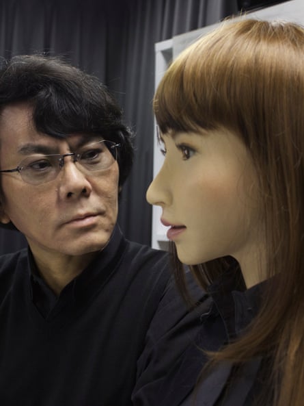 Prof Hiroshi Ishiguro with Erica, his latest humanoid robot.
