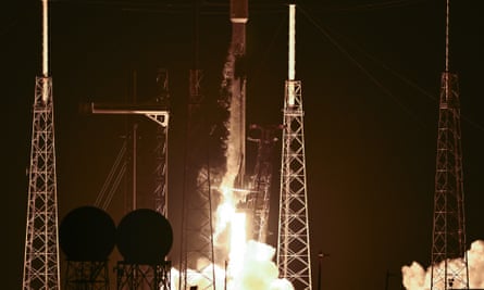 A SpaceX Falcon 9 rocket launches the Bandwagon-3 ride-share mission from Launch Complex 40 at the Cape Canaveral Space Force Station at night.