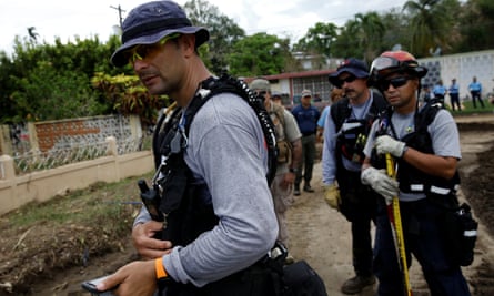 Members of Fema’s Urban Search and Rescue team conduct a search operation in Yauco, Puerto Rico.
