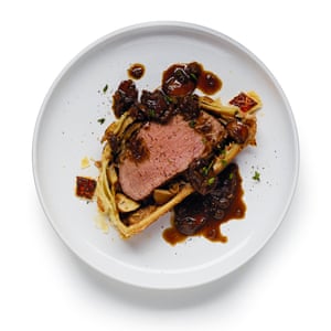 Cut the beef wellington into slices and serve with the reserved mushroom mix cooked in porcini liquid.