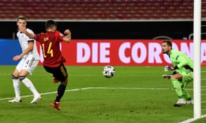 Spain’s defender Jose Luis Gaya Pena tuns the ball home for Spain’s equaliser.