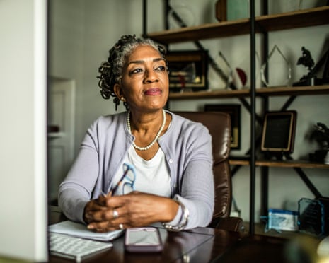 woman at desktop computer in home office