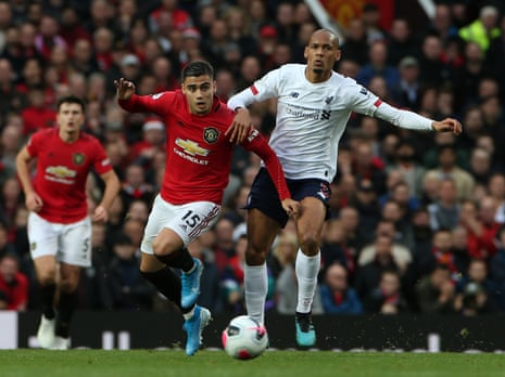 Andreas Pereira of Manchester United gets the better of Liverpool’s Fabinho.